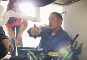 Plumbers in Bloomington IL explain what is going on wrong with a woman's sink