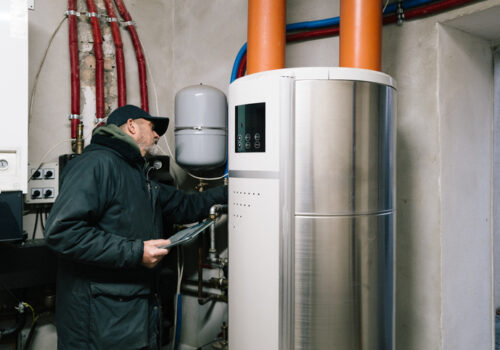 A technician from Everything Water Plumbing provides Water Heater Repair Bloomington IL services